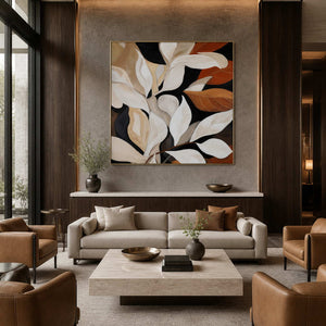 Gold framed autumn botanical painting above a pale sofa in a boutique hotel lobby.