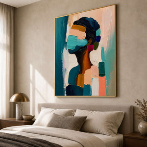 Textured profile artwork displayed in a luxury bedroom.