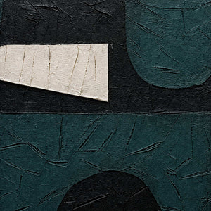 Close view of scored paint across deep green, black and cream geometric shapes.