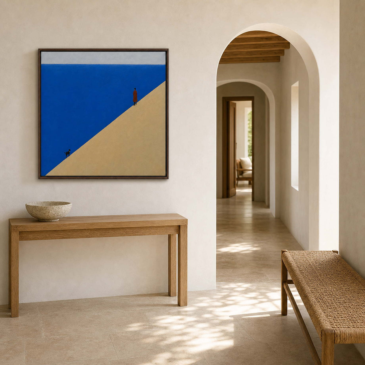Square blue and sand painting displayed in a Mediterranean entryway.