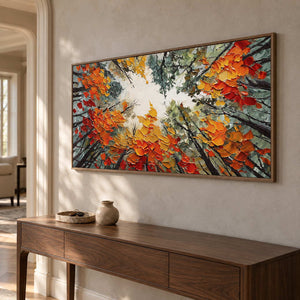 Angled view of the tree painting above a dark wood console near an arched doorway.