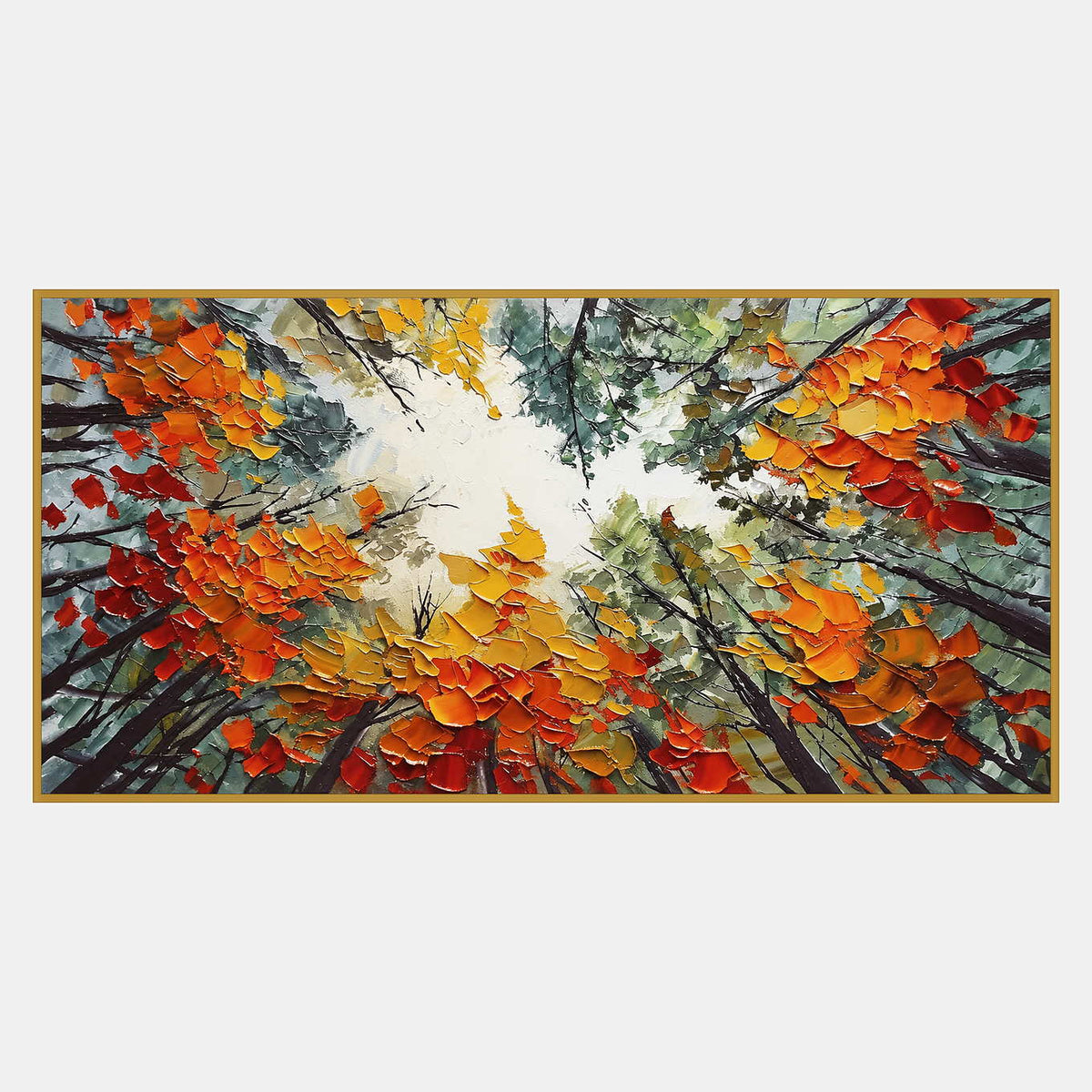 Wide upward view of dark tree trunks and orange, yellow, and green foliage surrounding a pale central sky.