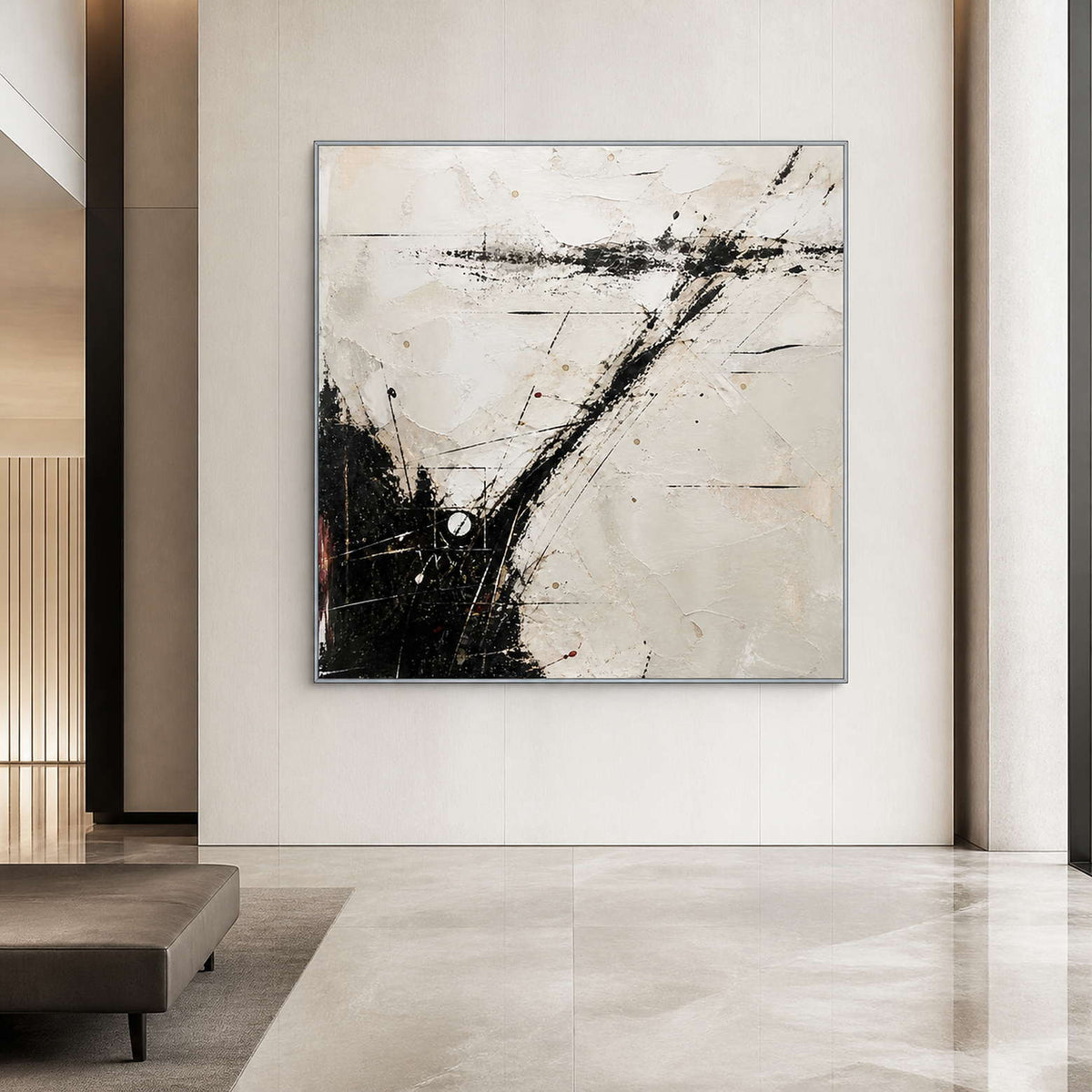 Large expressive abstract wall art in a hotel lobby with a silver frame.