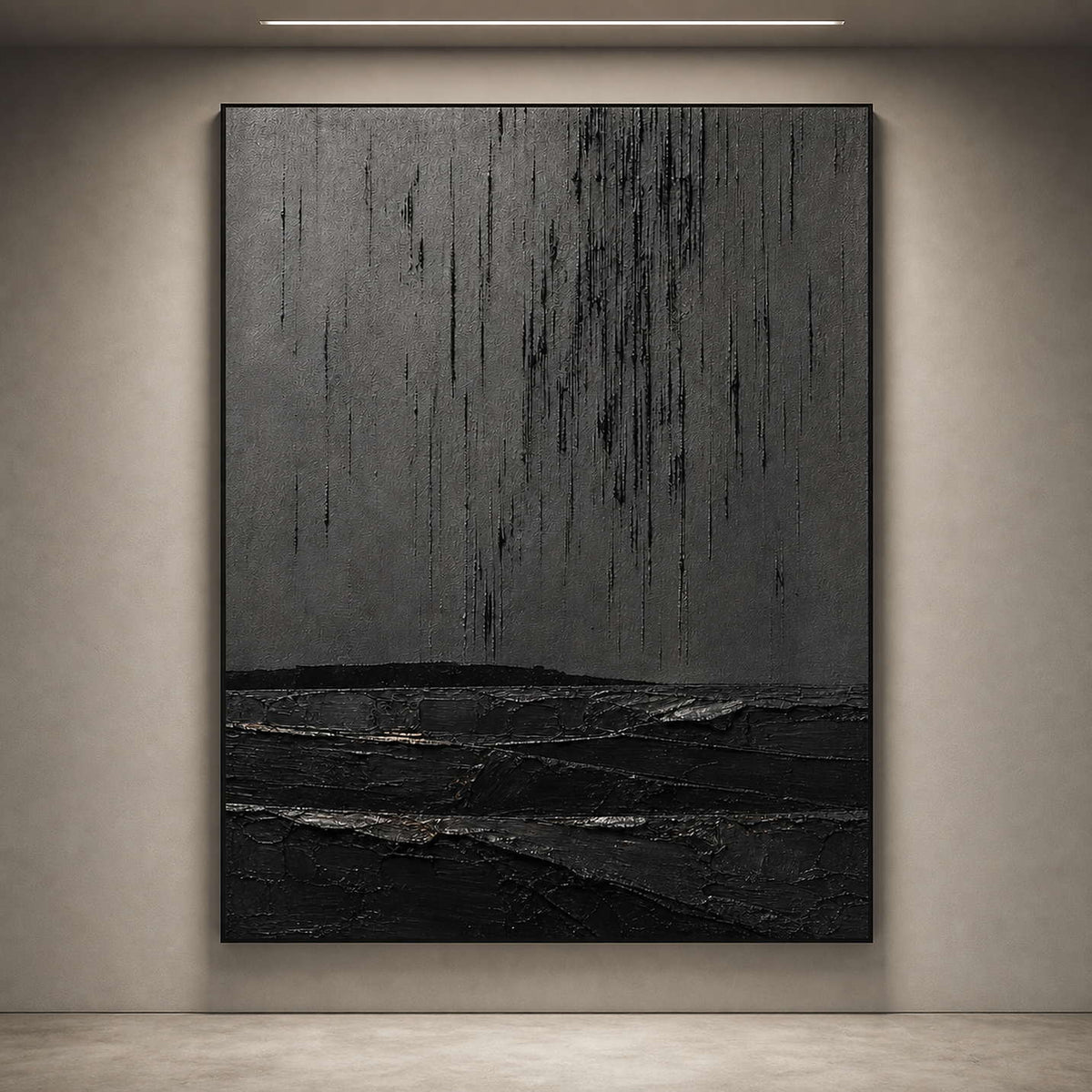Textured monochrome artwork viewed close-up on an art gallery wall.