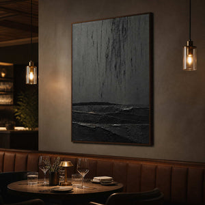 Black Wabi-Sabi wall art displayed in a warm boutique dining room.
