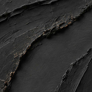 Close-up of raised hand-painted texture in black, earth tones, and neutral.