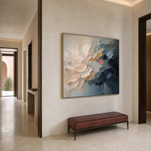 Square blue and blush floral wall art in a Milan entryway.