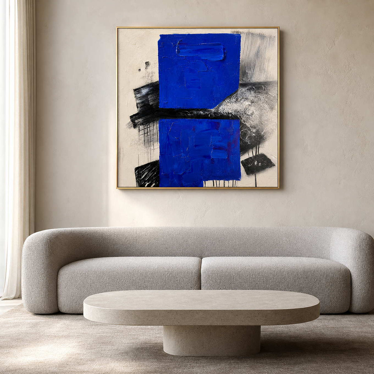 Cobalt blue textured abstract wall art in a cream modern living room.