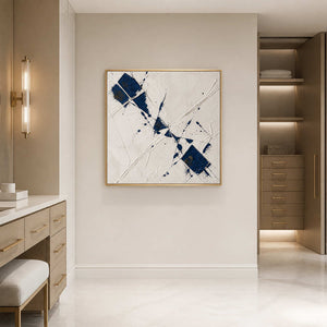 Minimalist blue abstract wall art displayed in a clean modern bathroom.