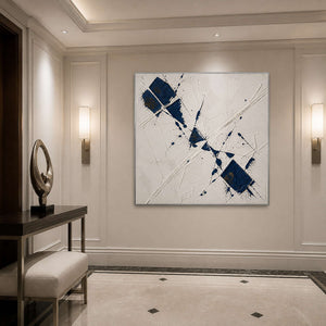 Blue and ivory textured wall art displayed above an entryway console.
