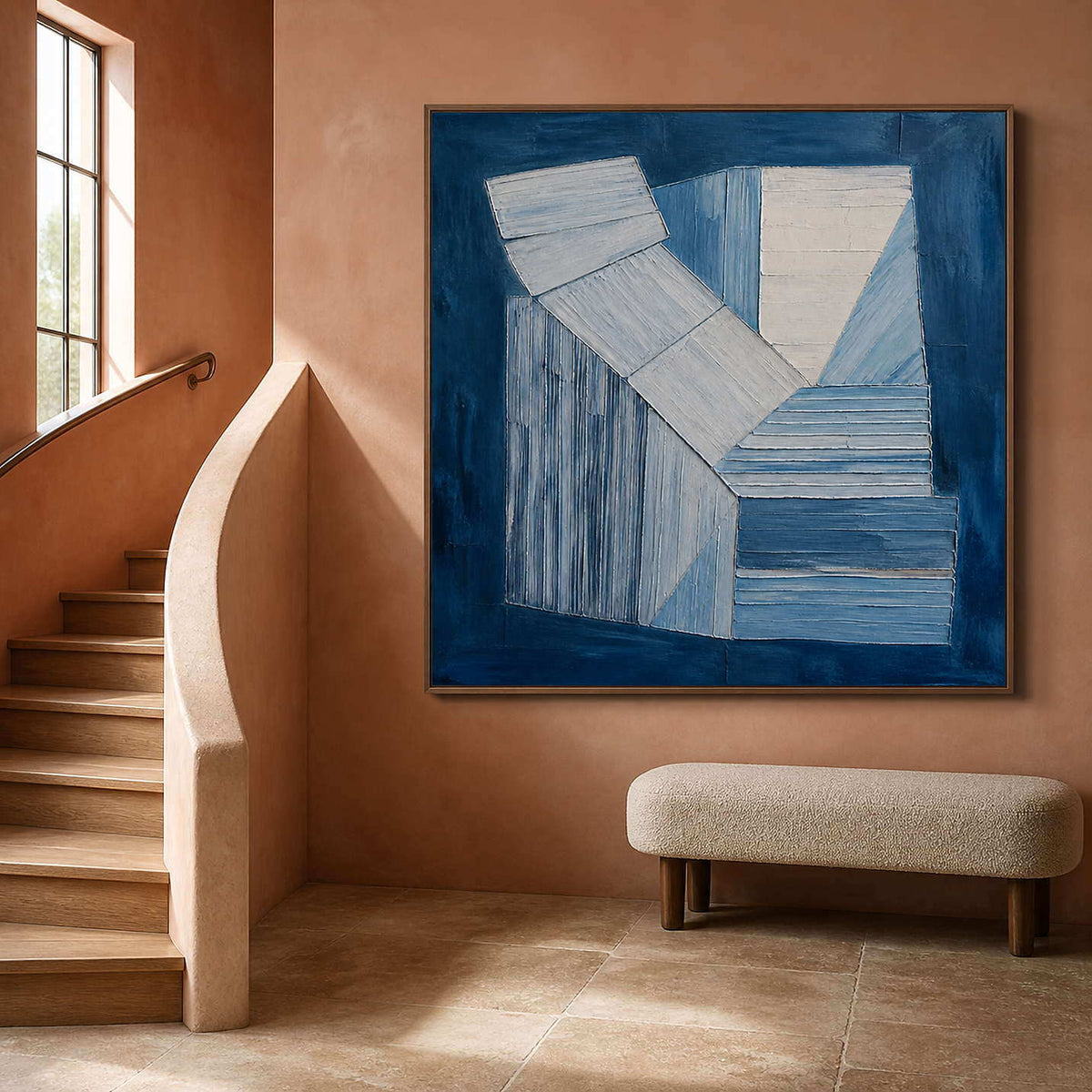 Indigo and white geometric forms wall art in a contemporary home office.