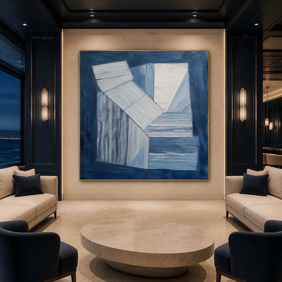 Indigo and white geometric forms wall art in a contemporary hospitality lounge.