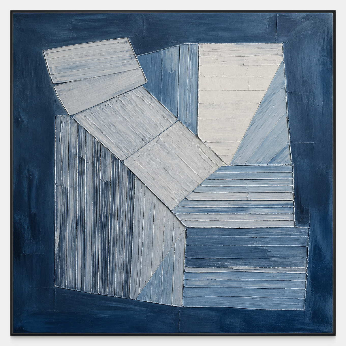 Hand-painted indigo and white geometric forms canvas with raised texture.