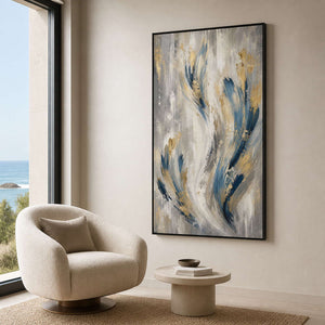 Blue and gold abstract shown from the side in an ocean-view reading area.
