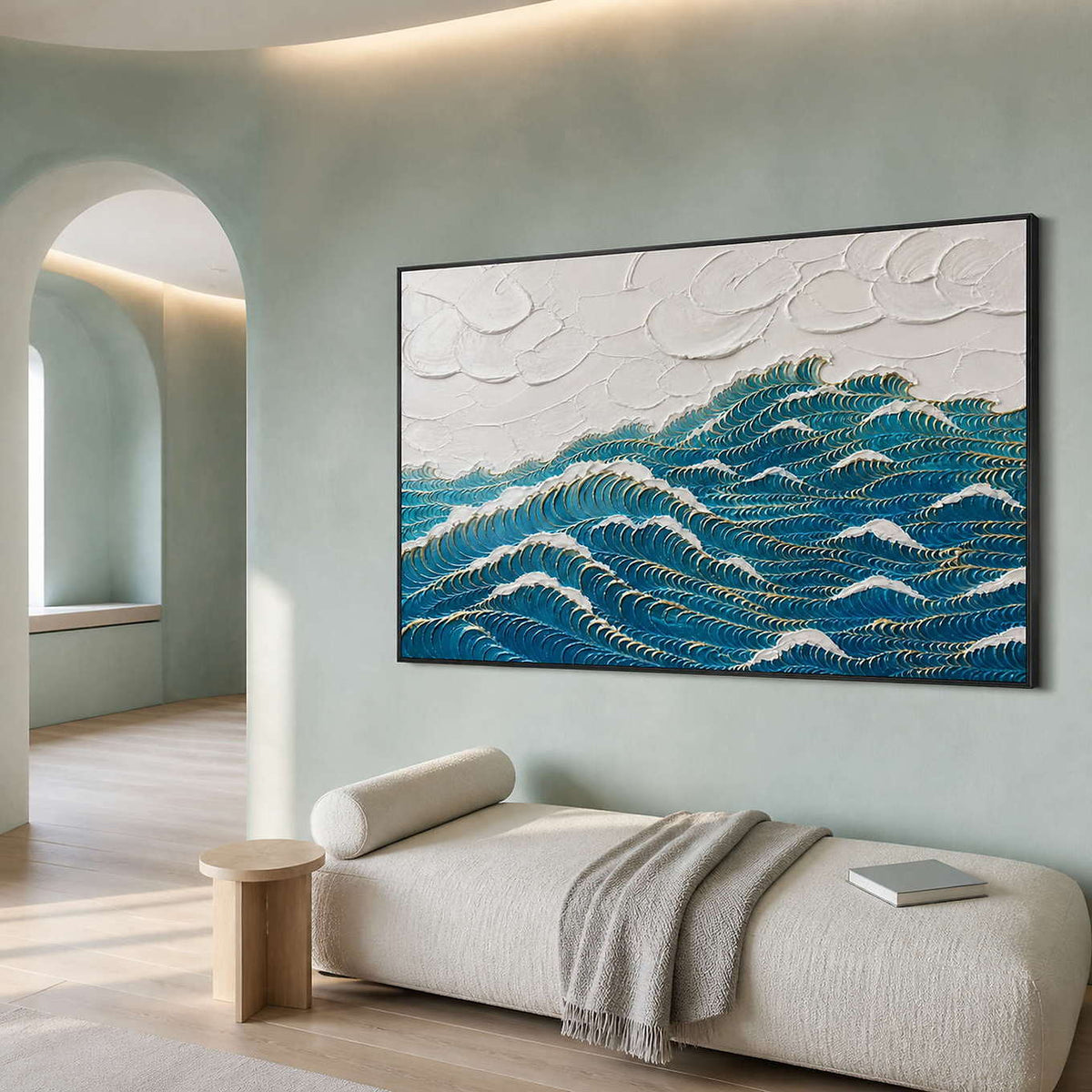 Deep blue waves edged with gold wall art in a contemporary bedroom.