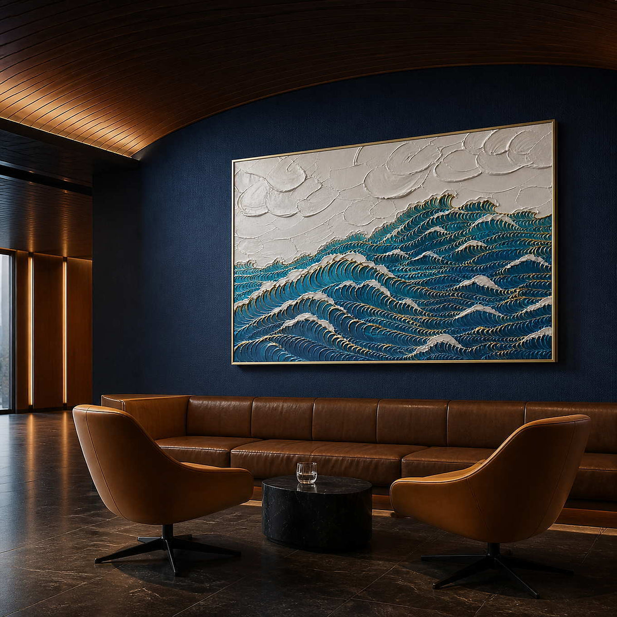 Deep blue waves edged with gold wall art in a contemporary hospitality lounge.