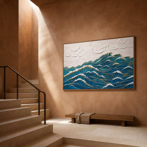 Deep blue waves edged with gold wall art in a contemporary stair hall.
