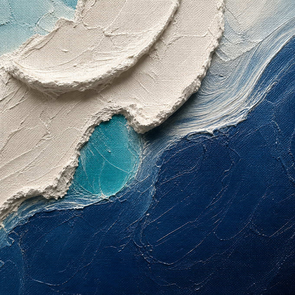 Close-up of raised hand-painted texture in blue, white, and neutral.
