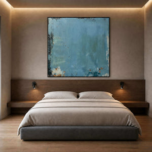Atmospheric aqua wall art styled in a warm neutral bedroom.