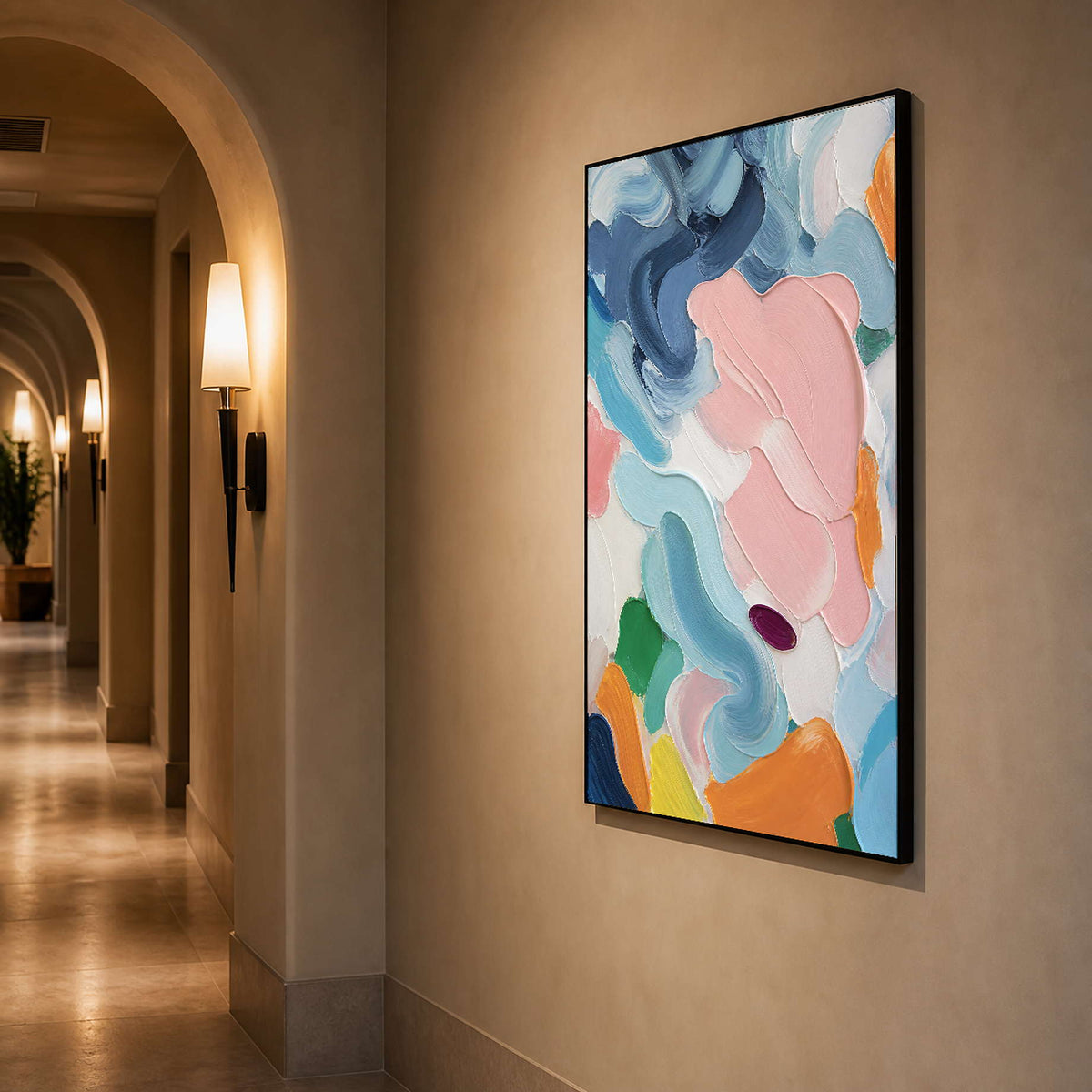 Vertical colorful abstract art displayed in a warmly lit arched hallway.