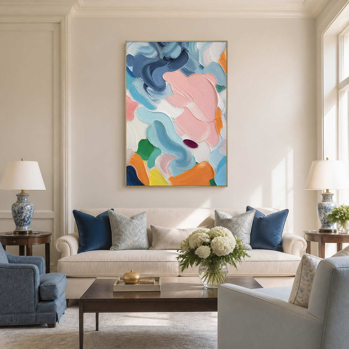 Blush and blue textured abstract wall art in a bright classic living room.