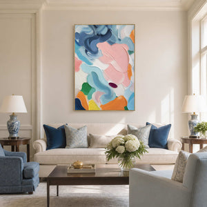 Blush and blue textured abstract wall art in a bright classic living room.