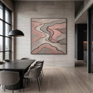 Blush and gray contour lines wall art in a contemporary dining room.