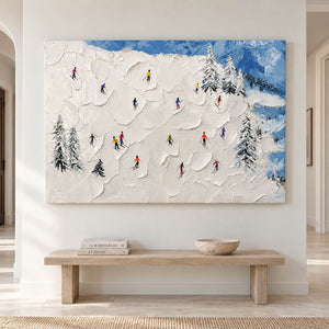 Hand-painted snowy mountain canvas with colorful skiers and pine trees, displayed in a hallway without an outer frame.