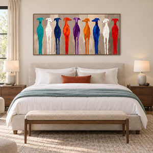 Cheerful Company in a wood frame above a cream bed with blue-green linen and a small rust cushion.