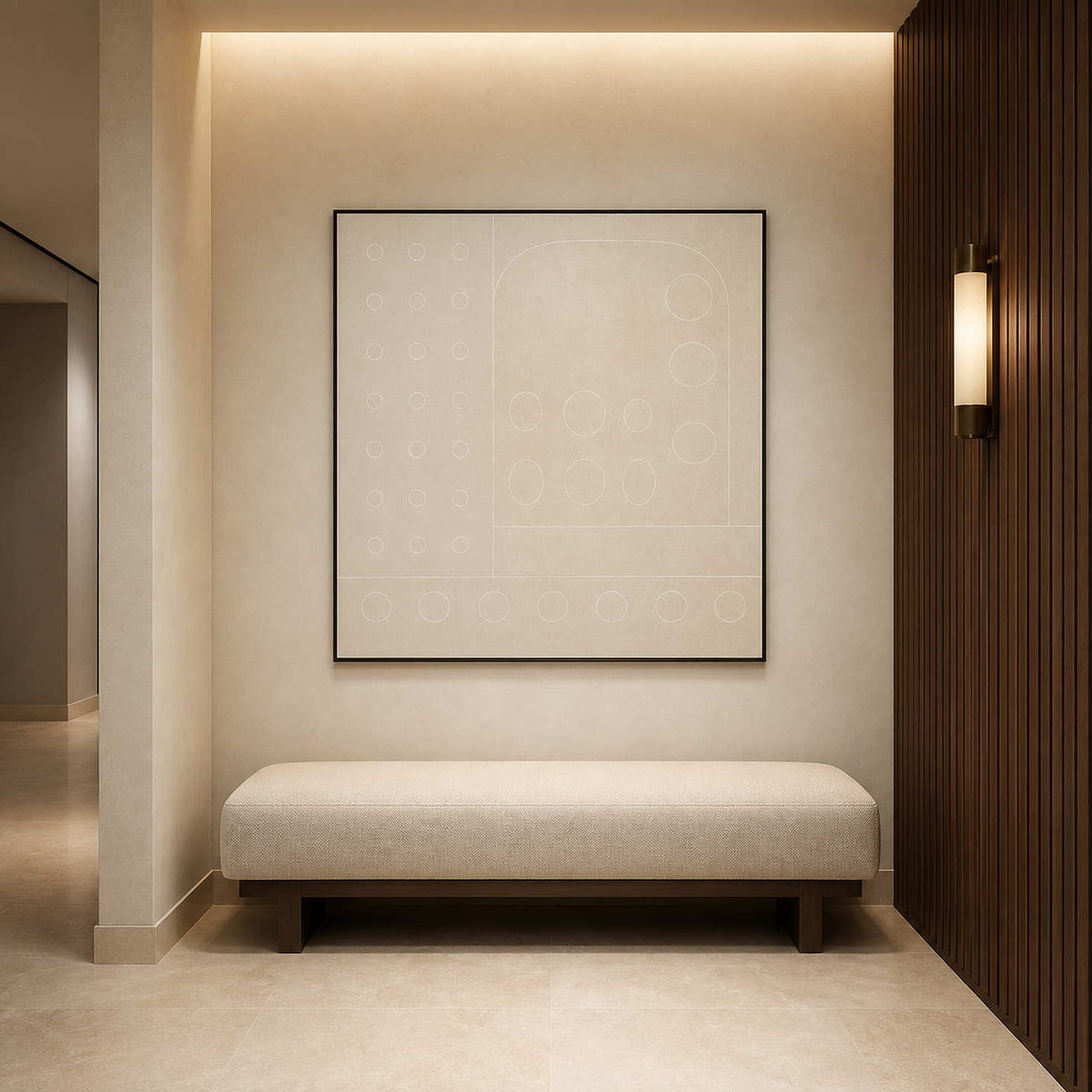 Ivory geometric artwork displayed in a softly lit hotel corridor.