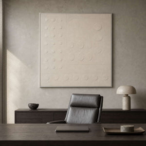 Textured ivory abstract artwork in a refined minimalist office.