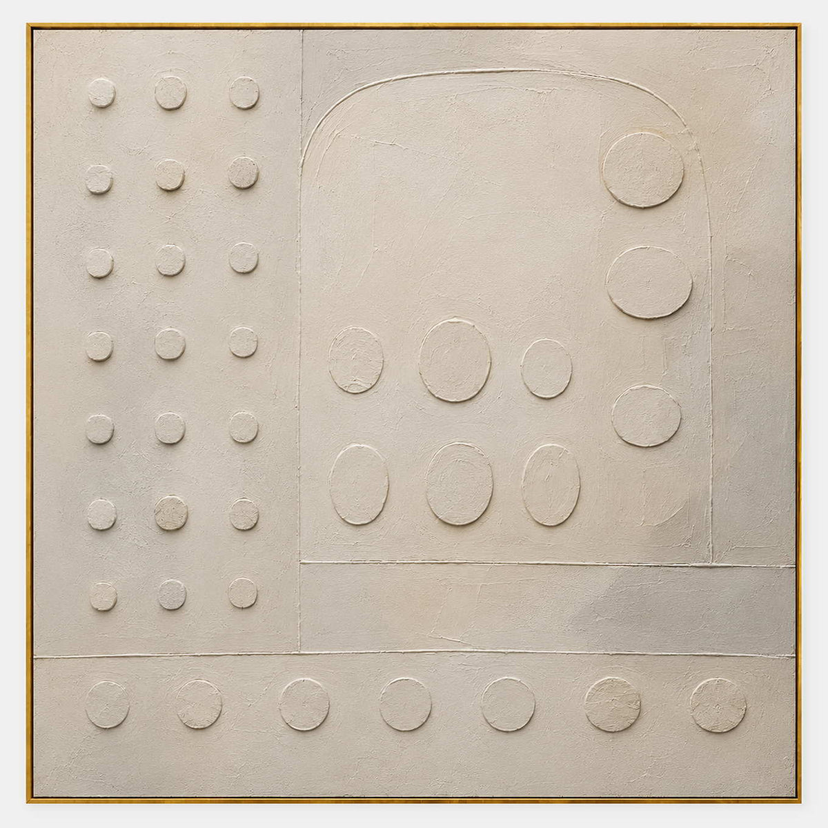 Warm white textured wall art with raised circles and quiet geometry.