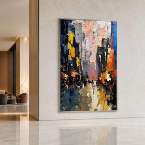 City Lights Break Through the Rain in a silver-framed hotel lobby