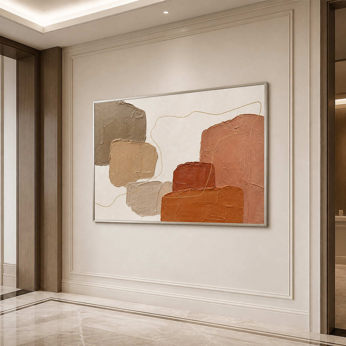 Warm abstract wall art displayed above a minimalist hallway console.