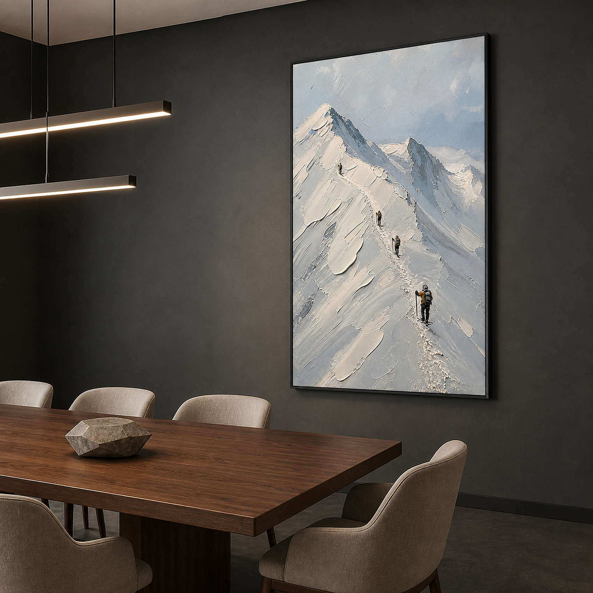 Pale mountain painting displayed in a dark refined dining room.