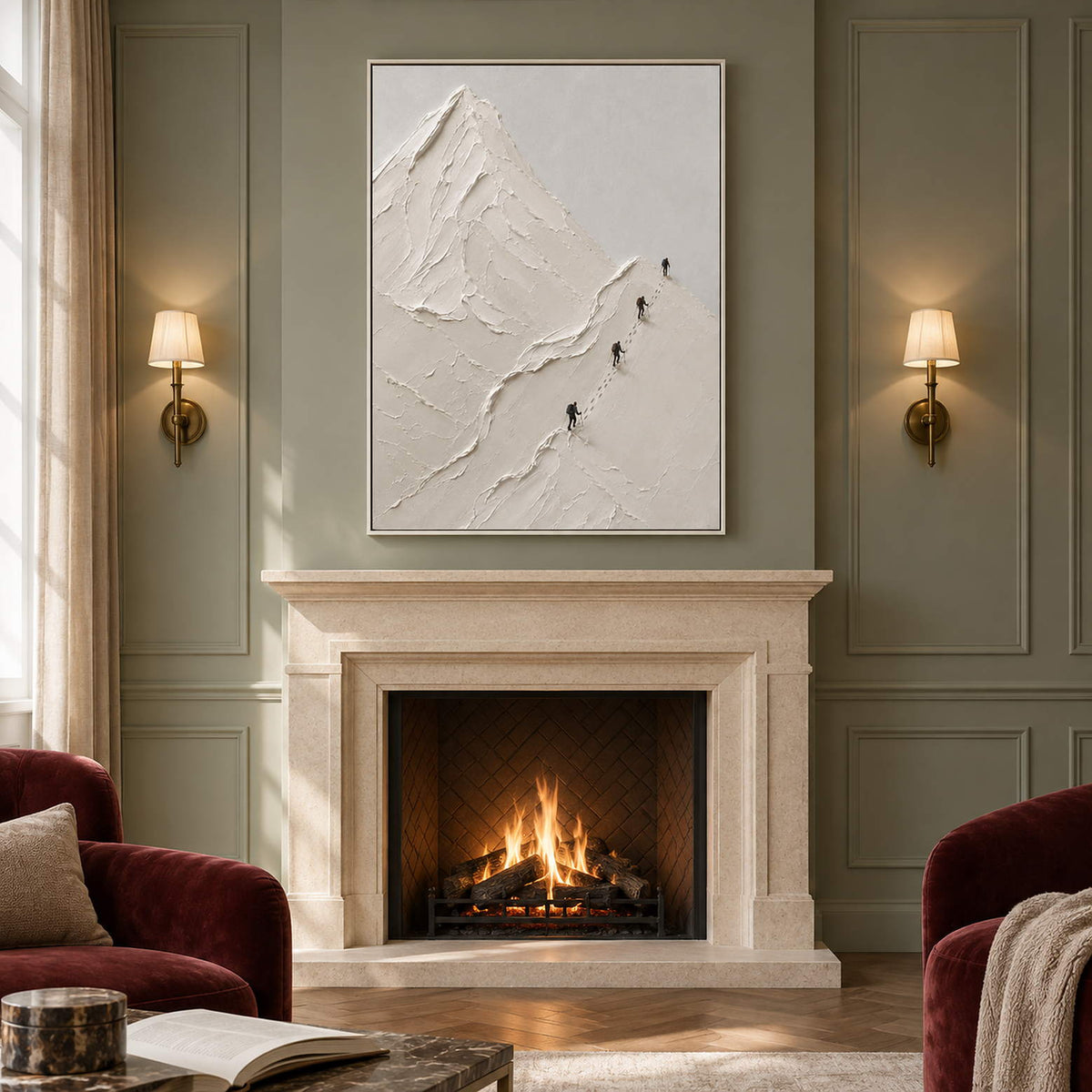Four climbers ascending sculpted white mountain ridges in a vertical composition, displayed beside or above a fireplace in a white frame.