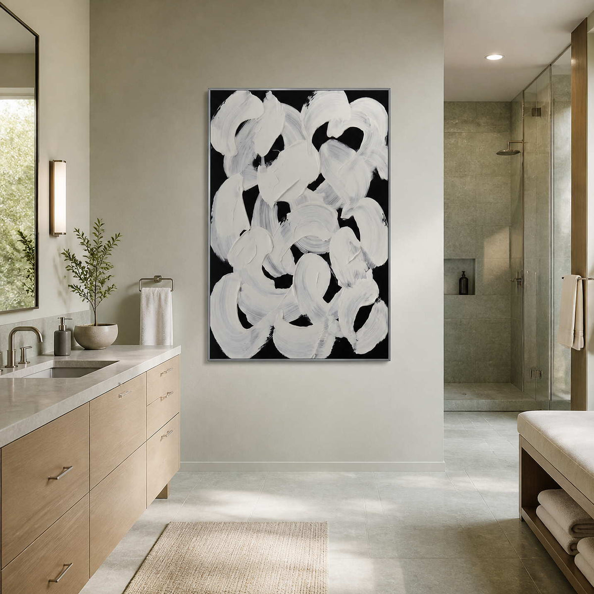 White textured arcs beside a pale wooden bathroom vanity and glass shower.