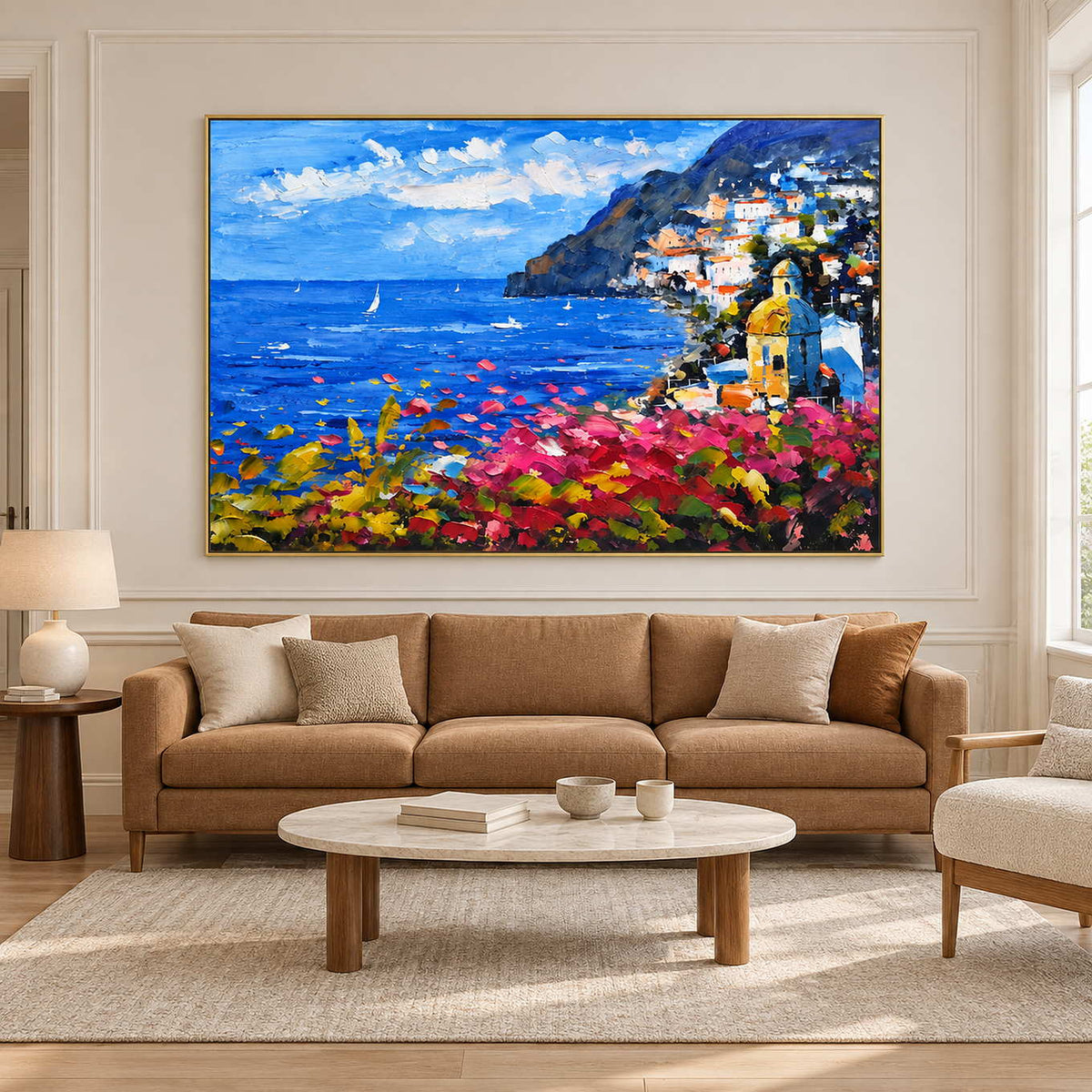 Pink-flower coastal painting above a tan sofa.