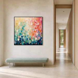 Square pastel wall art displayed in a bright townhouse entryway.
