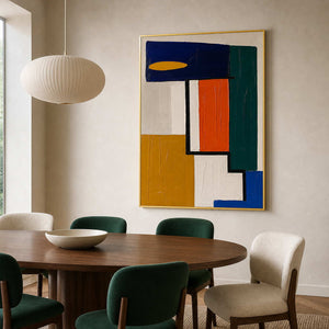 Geometric abstract wall art in a rich modern dining room.