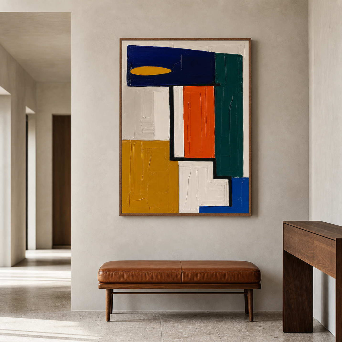 Modern abstract art above a caramel bench in a gallery hallway.