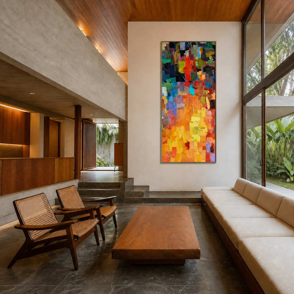 Tall multicolor abstract wall art displayed in an architectural family room.