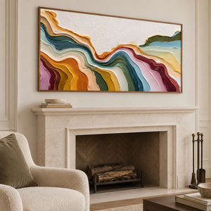 Angled view of the flowing abstract artwork above a pale stone fireplace.