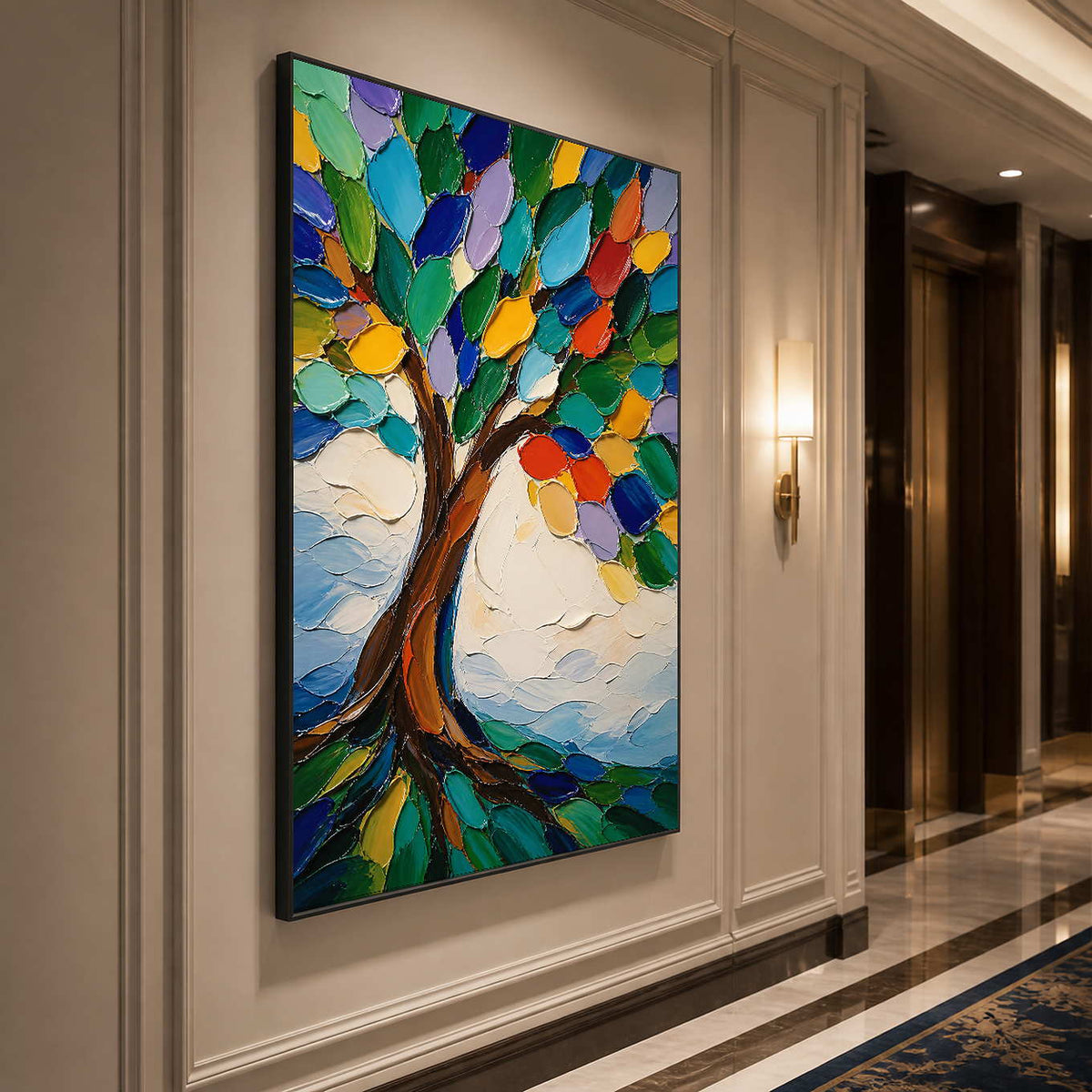 Multicolor textured tree art displayed along a warmly lit contemporary hallway.