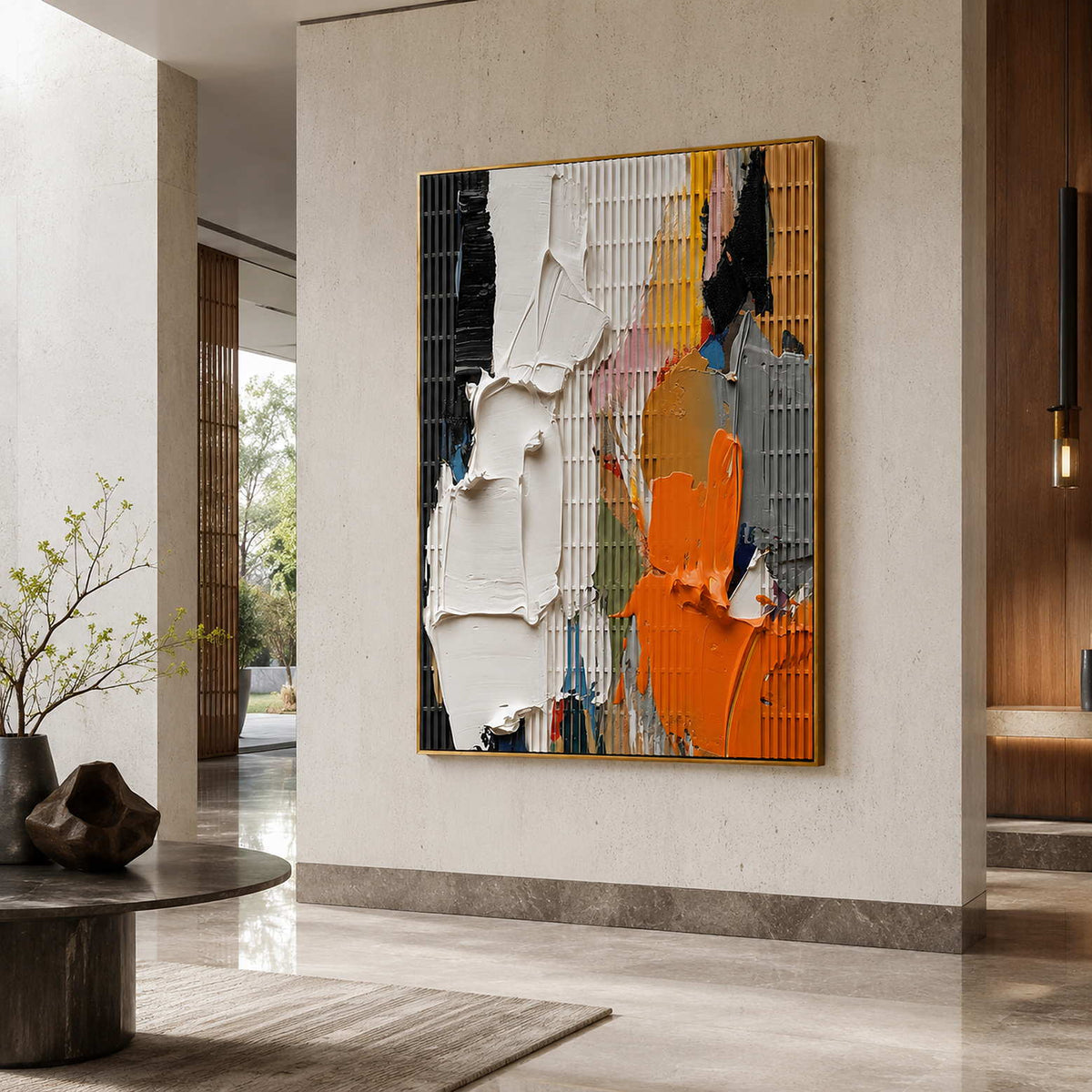 Bold textured abstract wall art displayed in a hotel lobby.