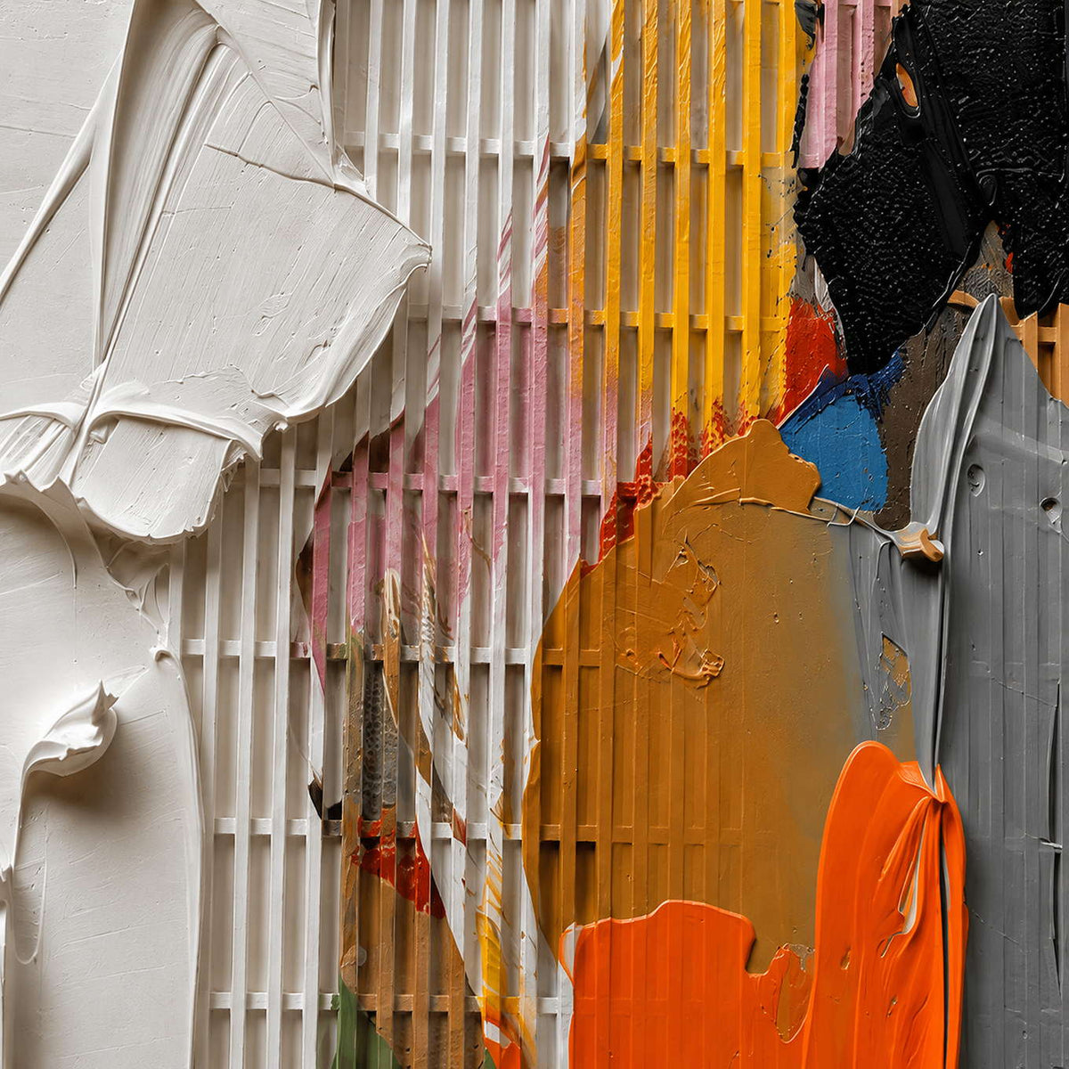Close-up of raised white relief and orange paint texture.