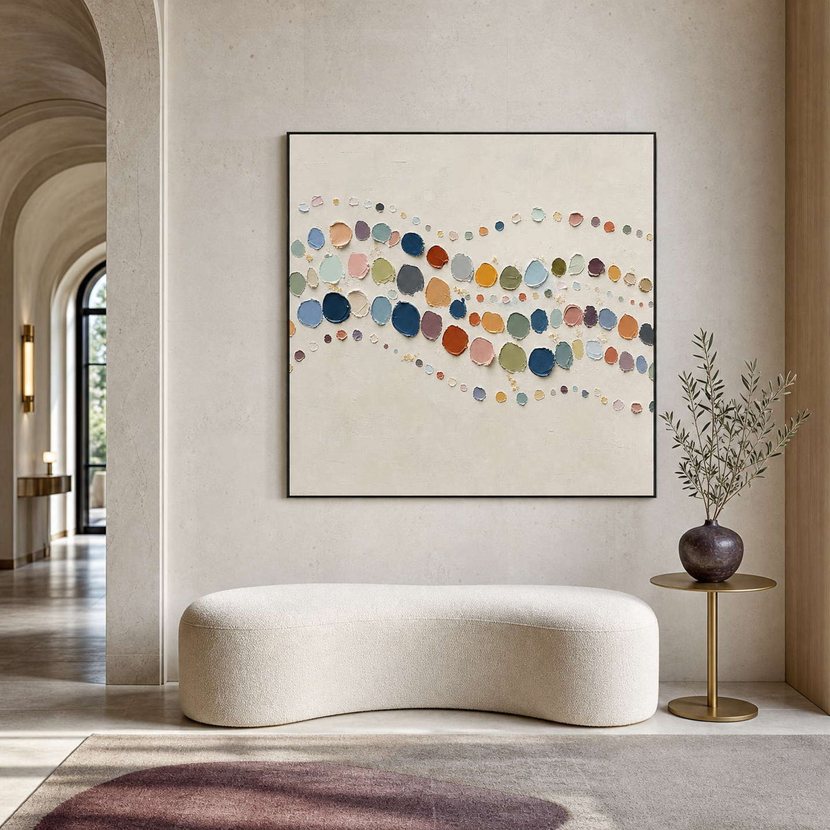 Colorful textured abstract wall art in a refined hotel lobby.