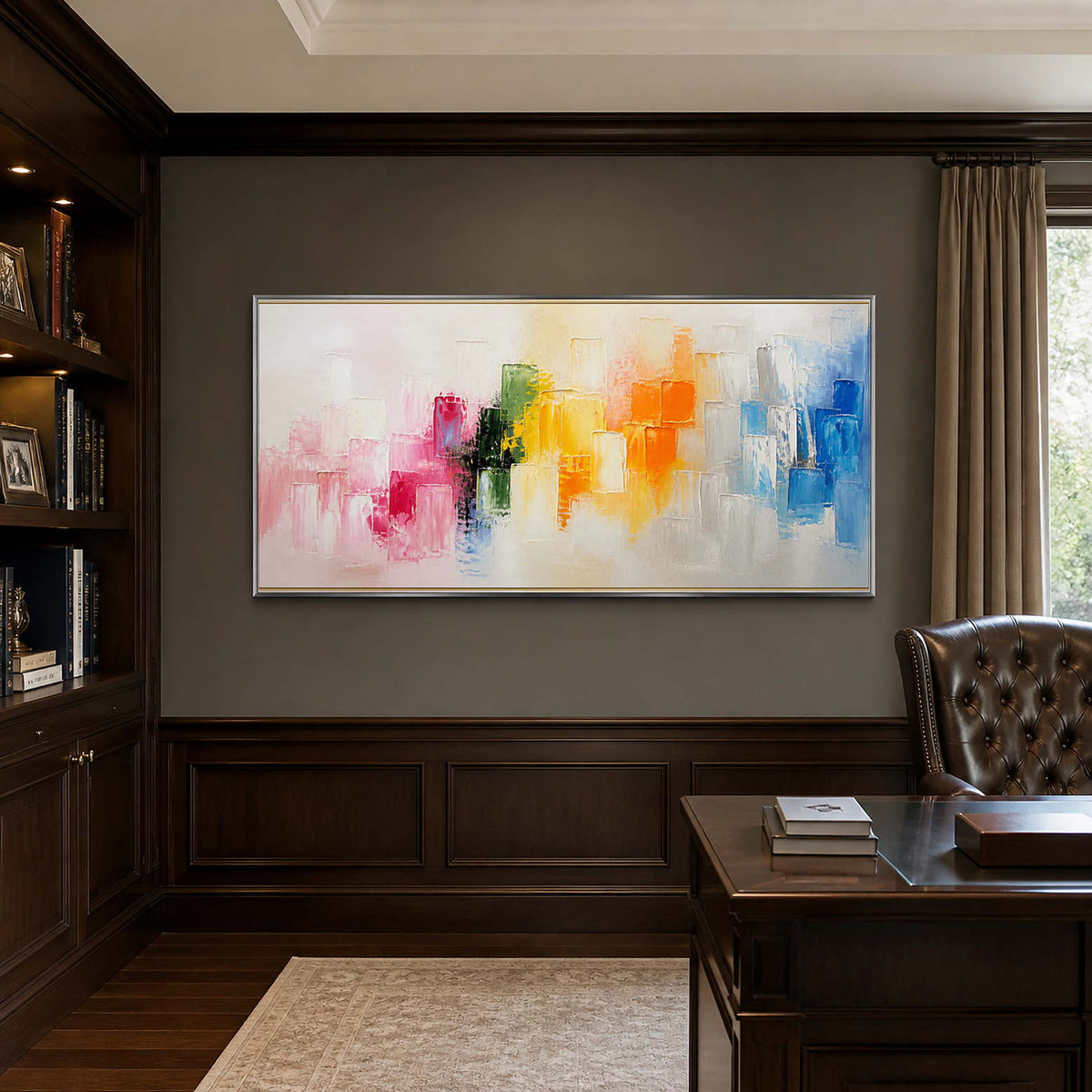 Vibrant textured abstract painting displayed in a refined dark wood office.