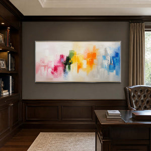 Vibrant textured abstract painting displayed in a refined dark wood office.