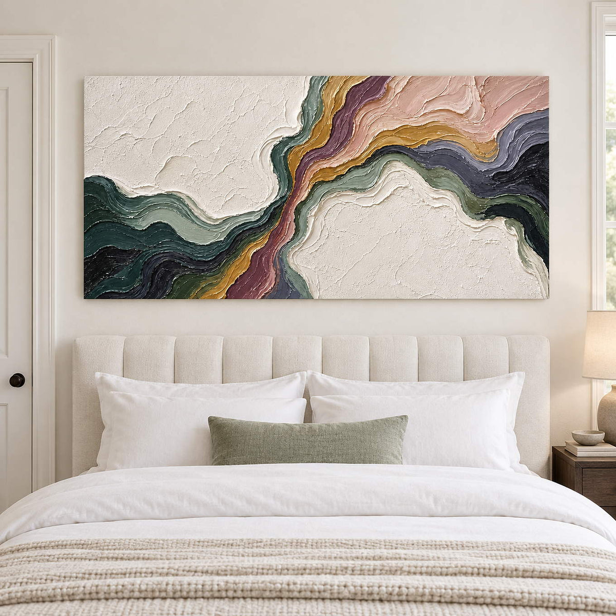 Flowing green, blush, ochre and charcoal bands through white texture without an outer frame, displayed above a bed.